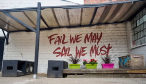 'Fail we may, sail we mus' painted on the wll of new Night Ktchen venue, Fewer Than One